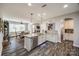 Open kitchen with an island, stainless steel appliances, and adjacent dining area at 324 Kerrydale Ct # 106, Clover, SC 29710