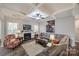 Comfortable living room with fireplace, coffered ceiling, and stylish decor at 324 Kerrydale Ct # 106, Clover, SC 29710