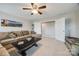 Comfortable living room featuring a large sectional sofa, ceiling fan, and plenty of natural light at 324 Kerrydale Ct # 106, Clover, SC 29710