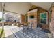 Covered patio with brick and an outdoor table at 324 Kerrydale Ct # 106, Clover, SC 29710
