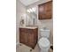 Bathroom featuring a granite vanity, tile floors, and a modern storage cabinet at 3509 Havenwood Rd, Dallas, NC 28034