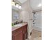 Bathroom features a vanity with granite countertop and a shower and tub combination at 3509 Havenwood Rd, Dallas, NC 28034