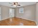 Bedroom boasts hardwood floors and an ensuite bathroom at 3509 Havenwood Rd, Dallas, NC 28034