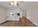 Bright living space with hardwood floors, white trim and a view into the kitchen at 3509 Havenwood Rd, Dallas, NC 28034