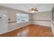 Inviting living room featuring hardwood floors, natural light, and neutral paint palette at 3509 Havenwood Rd, Dallas, NC 28034