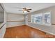 Inviting living room with gleaming hardwood floors and a ceiling fan for added comfort at 3509 Havenwood Rd, Dallas, NC 28034