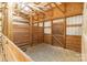 Barn interior with wood beams and gravel floor, offering a rustic and functional space at 3526 Harmony Hwy, Harmony, NC 28634