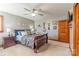 The main bedroom has neutral walls, a wood-toned floor, and decor shelves at 3526 Harmony Hwy, Harmony, NC 28634