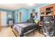 Bedroom features a desk, monitor and mini fridge, ideal for a comfortable home office setup at 3526 Harmony Hwy, Harmony, NC 28634