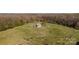 Picturesque parcel of land featuring a charming barn and rolling green hills in a serene setting at 3526 Harmony Hwy, Harmony, NC 28634