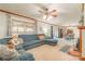 Spacious living room offers a seamless flow to the dining room and comfortable, stylish sectional sofa at 3526 Harmony Hwy, Harmony, NC 28634