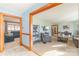 Bright living room featuring neutral carpet, light blue walls, and a cozy seating area at 3526 Harmony Hwy, Harmony, NC 28634