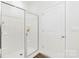 Clean and modern bathroom with glass-enclosed shower and white fixtures at 3543 Cramer Creek Dr, Gastonia, NC 28056