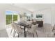 Inviting dining area featuring a table for six with views of the outdoors and a cozy living area at 3543 Cramer Creek Dr, Gastonia, NC 28056