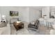 This is a modern living area with a TV and kitchen view at 3543 Cramer Creek Dr, Gastonia, NC 28056