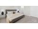 Relaxing bedroom featuring a comfortable bed, soft lighting, and stylish bedside tables at 3543 Cramer Creek Dr, Gastonia, NC 28056