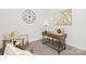 Bright office with comfortable seating, desk, stylish clock, and modern artwork at 3543 Cramer Creek Dr, Gastonia, NC 28056