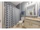 Bathroom featuring vanity with granite countertop, and a shower with a blue patterned shower curtain at 3613 Martele Dr, Mint Hill, NC 28227