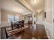 Spacious dining room with wainscoting, hardwood floors, and lots of natural light at 3613 Martele Dr, Mint Hill, NC 28227