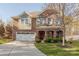 Beautiful two-story brick home with a well-manicured lawn and inviting entrance at 3613 Martele Dr, Mint Hill, NC 28227