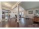 Open-concept living area with hardwood floors and natural light, ideal for Gathering gatherings at 3613 Martele Dr, Mint Hill, NC 28227