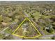 Aerial view of a property with clearly marked boundary lines amid a neighborhood with mature trees at 3647 Glen Haven Sw Dr, Concord, NC 28027
