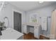 Bathroom featuring vanity, drawers, and a large mirror at 3647 Glen Haven Sw Dr, Concord, NC 28027