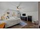 Spacious bedroom featuring vaulted ceilings, a ceiling fan, and a large window at 3647 Glen Haven Sw Dr, Concord, NC 28027