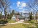 Inviting single-Gathering home with a spacious driveway leading to an attached two-car garage at 3647 Glen Haven Sw Dr, Concord, NC 28027