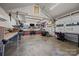 Large, well-organized garage, ideal for workshop and storage needs at 3647 Glen Haven Sw Dr, Concord, NC 28027