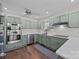 Well-lit kitchen with modern appliances, ample cabinet space, and stainless steel dishwasher at 3647 Glen Haven Sw Dr, Concord, NC 28027