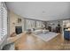 Spacious living room with hardwood floors, fireplace, recessed lighting and neutral paint at 3647 Glen Haven Sw Dr, Concord, NC 28027