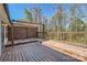Expansive wooden deck with stylish pergola overlooking a private yard at 3753 Capps Hill Dr, Charlotte, NC 28216