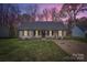 Charming single-story home with manicured lawn and welcoming front porch at 3753 Capps Hill Dr, Charlotte, NC 28216