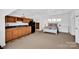 Upstairs apartment with kitchenette, bed and open floorplan at 411 Walnut St, Davidson, NC 28036
