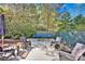 Outdoor deck with ping pong table and comfortable seating, perfect for entertaining at 411 Walnut St, Davidson, NC 28036
