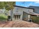 View of the back exterior of the home showing the siding and a small outdoor space at 4340 N Center Ne St # 508, Hickory, NC 28601