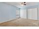 Comfortable bedroom featuring carpet, neutral walls, and ample closet space for storage at 4340 N Center Ne St # 508, Hickory, NC 28601
