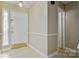 Tiled entryway featuring a white front door with decorative glass, adjacent to neutral-colored walls at 4340 N Center Ne St # 508, Hickory, NC 28601