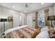Comfortable bedroom featuring a ceiling fan and large window with natural light at 45008 Wigeon Ln # 101, Indian Land, SC 29707
