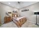 Cozy bedroom with neutral walls, recessed lighting, and decorative shelving for personal touches at 45008 Wigeon Ln # 101, Indian Land, SC 29707