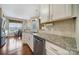 Bright kitchen with stainless dishwasher and countertops overlooking a lovely breakfast nook at 45008 Wigeon Ln # 101, Indian Land, SC 29707