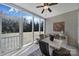 Charming screened-in porch with a ceiling fan and views of the backyard at 45008 Wigeon Ln # 101, Indian Land, SC 29707