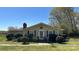 Charming single-story home with a chimney, front lawn, and landscaping at 4807 Lon Parker Rd # 1, Waxhaw, NC 28173