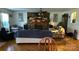 Cozy living room with a stone fireplace, hardwood floors, and neutral decor at 4807 Lon Parker Rd # 1, Waxhaw, NC 28173