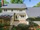 Aerial view of backyard featuring mature trees and patio at 5232 Silchester Ln, Charlotte, NC 28215