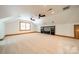 Large bonus room with carpet and ceiling fans at 5232 Silchester Ln, Charlotte, NC 28215