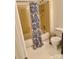 Bathroom with a tub with shower and a shower curtain at 7412 Broken Oak Ln, Charlotte, NC 28226