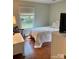 Bedroom with hardwood floors, desk and rocking chair at 7412 Broken Oak Ln, Charlotte, NC 28226