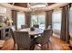 Dining area boasts natural light with a view of the pool at 880 Craigmont Nw Ln, Concord, NC 28027